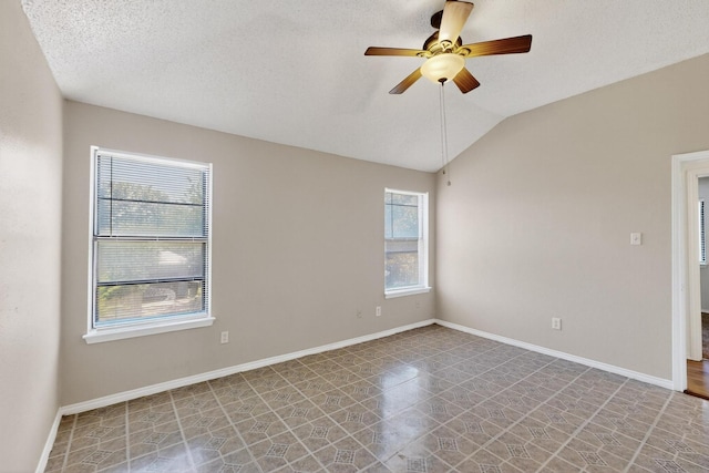10320 Wood Heights Dr, Dallas, TX 75227 - unfurnished room with a ceiling fan and vaulted ceiling