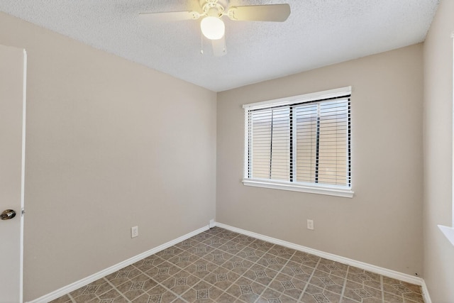 10320 Wood Heights Dr, Dallas, TX 75227 - spare room with a textured ceiling and ceiling fan