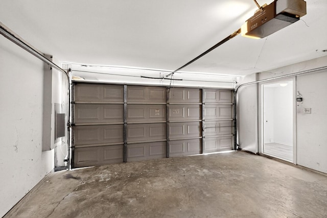 10320 Wood Heights Dr, Dallas, TX 75227 - garage featuring a garage door opener