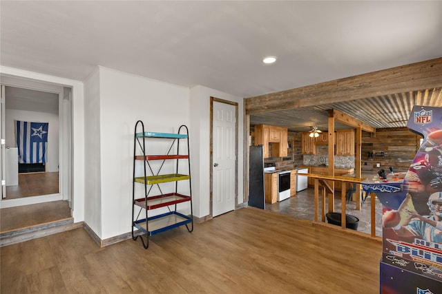 894 W Moonshine Rd, Seymour, TX 76380 - kitchen with white appliances, dark wood-type flooring, a ceiling fan, and tasteful backsplash