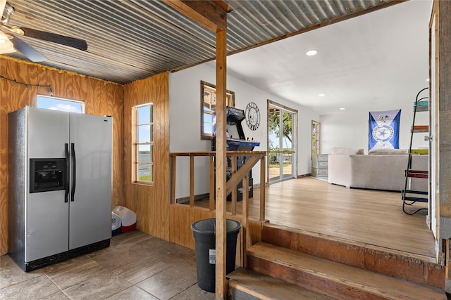 894 W Moonshine Rd, Seymour, TX 76380 - stairs with wooden walls, a ceiling fan, and recessed lighting