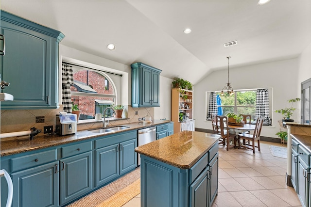 1740 Greenwood Ct, Prosper, TX 75078 - kitchen with decorative backsplash, a chandelier, a center island, vaulted ceiling, and recessed lighting