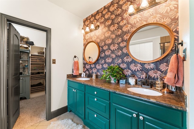 1740 Greenwood Ct, Prosper, TX 75078 - bathroom featuring wallpapered walls, double vanity, and tile patterned flooring