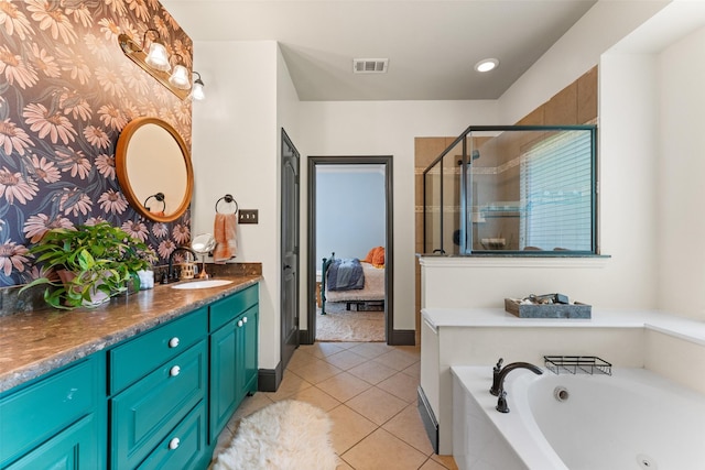 1740 Greenwood Ct, Prosper, TX 75078 - bathroom with vanity, a whirlpool tub, a stall shower, tile patterned floors, and ensuite bath