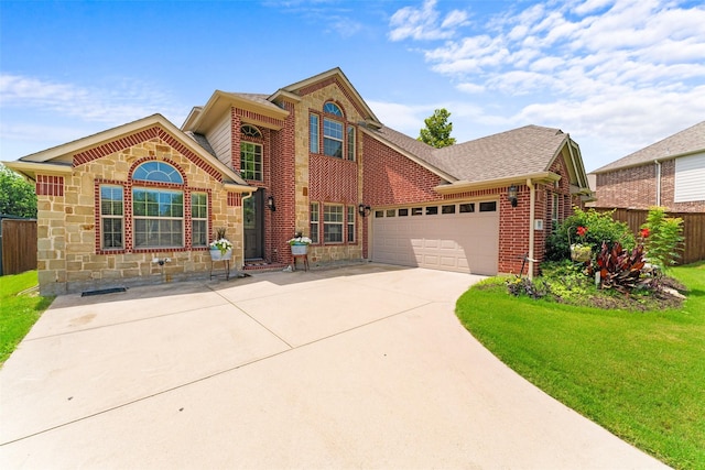 1740 Greenwood Ct, Prosper, TX 75078 - view of front facade with brick siding, a garage, concrete driveway, roof with shingles, and stone siding