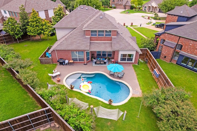 1740 Greenwood Ct, Prosper, TX 75078 - view of swimming pool with a fenced backyard, a patio area, outdoor dining area, and a residential view