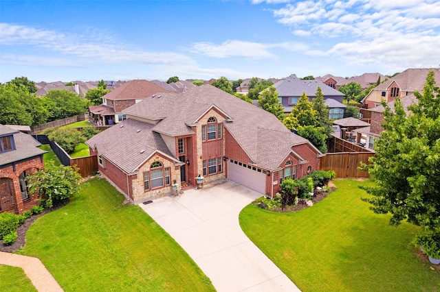 1740 Greenwood Ct, Prosper, TX 75078 - view of front of house with a residential view, an attached garage, brick siding, and driveway