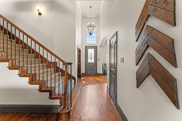 1740 Greenwood Ct, Prosper, TX 75078 - foyer entrance with a towering ceiling, wood finished floors, stairway, and arched walkways