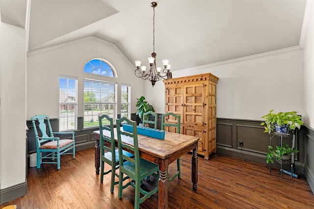 1740 Greenwood Ct, Prosper, TX 75078 - dining room with a chandelier, a wainscoted wall, dark wood-style flooring, vaulted ceiling, and a decorative wall