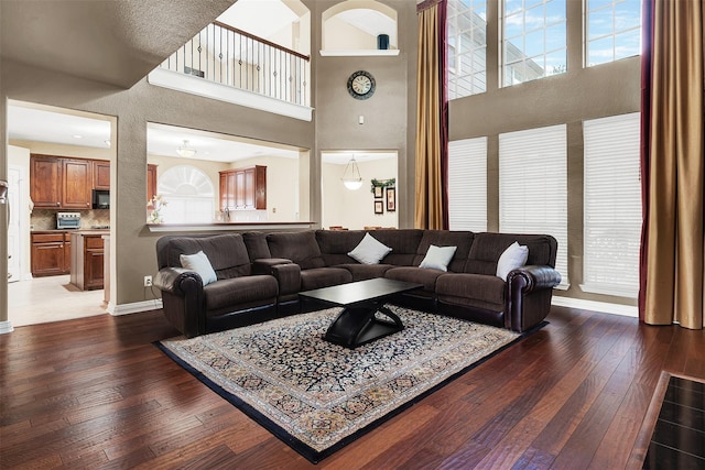3217 Tearose Dr, Richardson, TX 75082 - living room with dark wood-type flooring and a towering ceiling