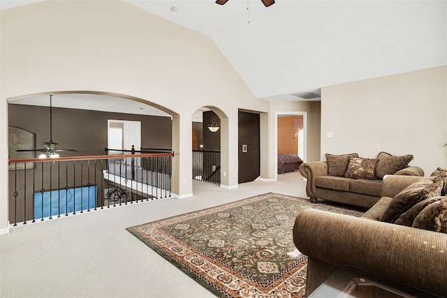 3217 Tearose Dr, Richardson, TX 75082 - living area featuring a ceiling fan, carpet flooring, high vaulted ceiling, and arched walkways