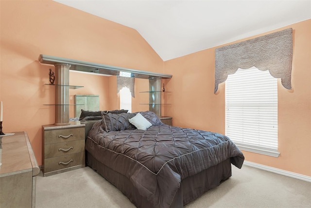 3217 Tearose Dr, Richardson, TX 75082 - carpeted bedroom with vaulted ceiling and baseboards