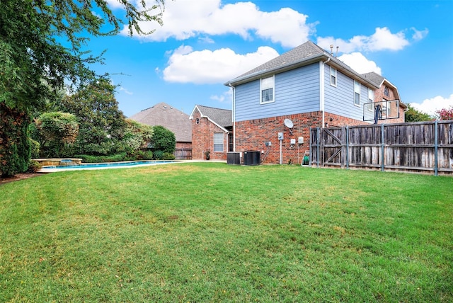 3217 Tearose Dr, Richardson, TX 75082 - back of house with brick siding and a pool