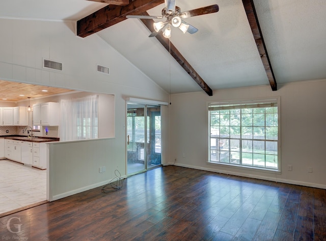 613 Pine Cone Dr, Haughton, LA 71037 - unfurnished living room with wood finished floors and a ceiling fan