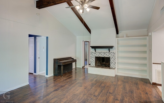613 Pine Cone Dr, Haughton, LA 71037 - unfurnished living room featuring ceiling fan, a brick fireplace, beam ceiling, wood finished floors, and high vaulted ceiling