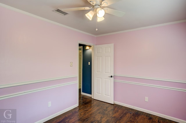 613 Pine Cone Dr, Haughton, LA 71037 - spare room with a ceiling fan, wood finished floors, and ornamental molding