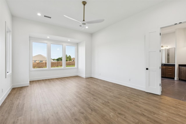 4930 Magnolia Trl, Midlothian, TX 76065 - spare room with ceiling fan, wood finished floors, and recessed lighting