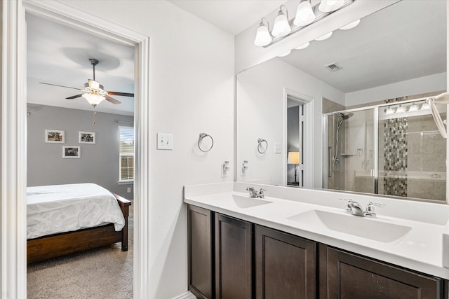 813 Evergreen St, Princeton, TX 75407 - bathroom with a shower stall, double vanity, ensuite bath, and a ceiling fan
