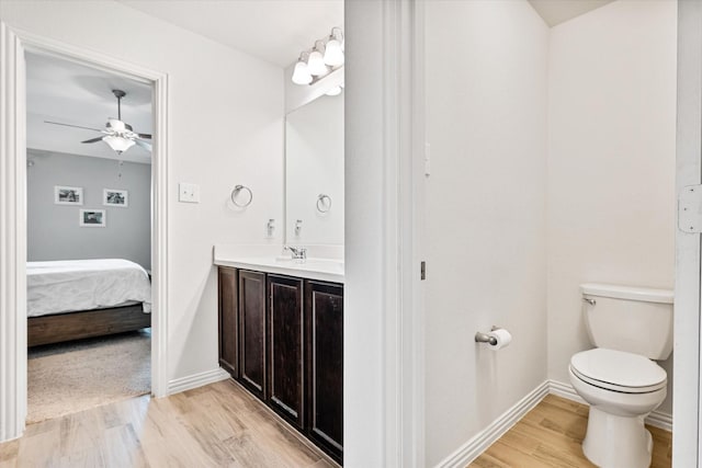 813 Evergreen St, Princeton, TX 75407 - ensuite bathroom featuring vanity, a ceiling fan, and wood finished floors