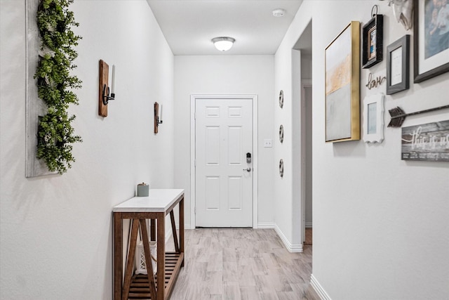 813 Evergreen St, Princeton, TX 75407 - corridor with baseboards and light wood-style floors