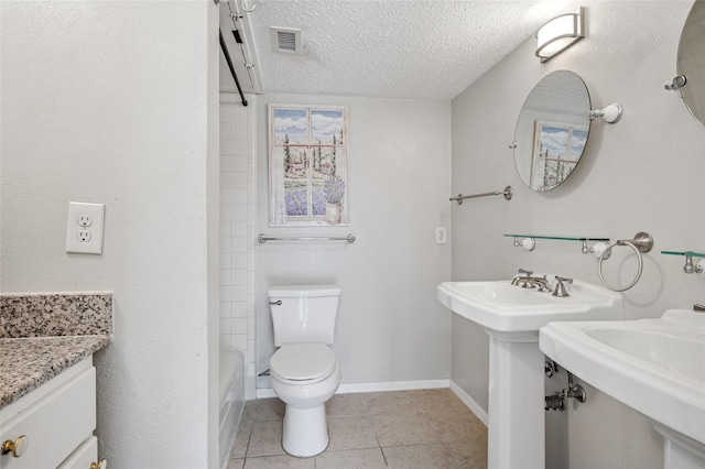 1822 Lakecrest Ct, Carrollton, TX 75006 - full bathroom with a textured ceiling, tile patterned flooring, and tub / shower combination