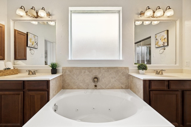 1205 Apache Lake Dr, Carrollton, TX 75010 - full bath with two vanities and a tub with jets