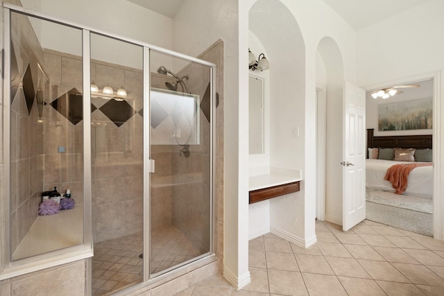 1205 Apache Lake Dr, Carrollton, TX 75010 - ensuite bathroom with tile patterned flooring, a stall shower, and a ceiling fan