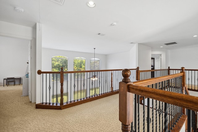 1205 Apache Lake Dr, Carrollton, TX 75010 - hall with carpet, an upstairs landing, and recessed lighting