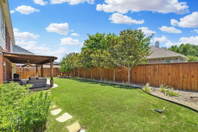 1205 Apache Lake Dr, Carrollton, TX 75010 - fenced backyard featuring an outdoor hangout area, ceiling fan, and a patio