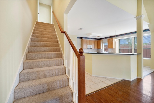 8201 Fountain Ridge Dr, Plano, TX 75025 - stairs featuring wood finished floors and baseboards