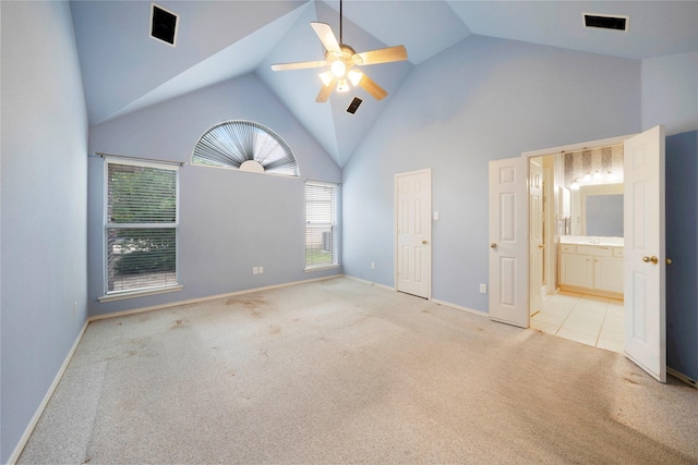 8201 Fountain Ridge Dr, Plano, TX 75025 - unfurnished bedroom with carpet flooring, multiple windows, high vaulted ceiling, ceiling fan, and ensuite bathroom