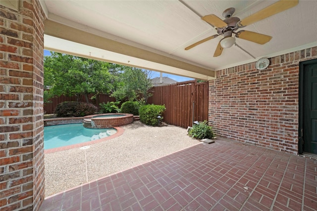 8201 Fountain Ridge Dr, Plano, TX 75025 - fenced backyard with ceiling fan, a patio, and a pool with connected hot tub