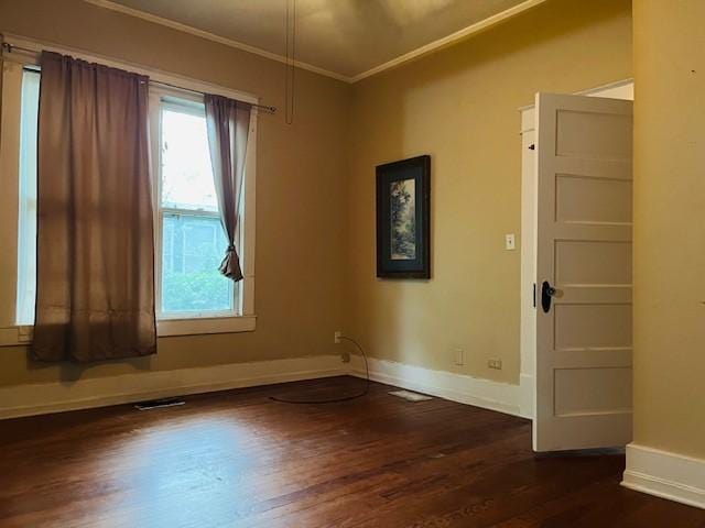 106 Lawrence Ave, Terrell, TX 75160 - unfurnished room featuring ornamental molding and wood finished floors