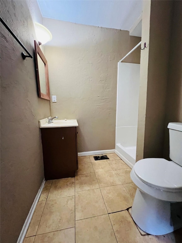 106 Lawrence Ave, Terrell, TX 75160 - full bathroom with vanity, a shower, tile patterned floors, and a textured wall