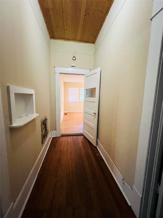 106 Lawrence Ave, Terrell, TX 75160 - hall with wooden ceiling, dark wood-type flooring, and heating unit