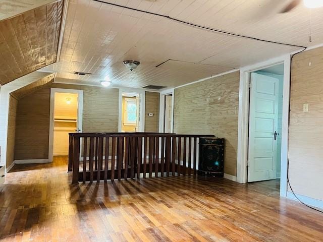 106 Lawrence Ave, Terrell, TX 75160 - unfurnished room with wood-type flooring, wood ceiling, and a ceiling fan