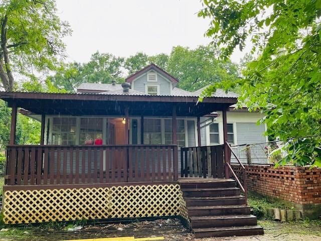 106 Lawrence Ave, Terrell, TX 75160 - rear view of property featuring covered porch