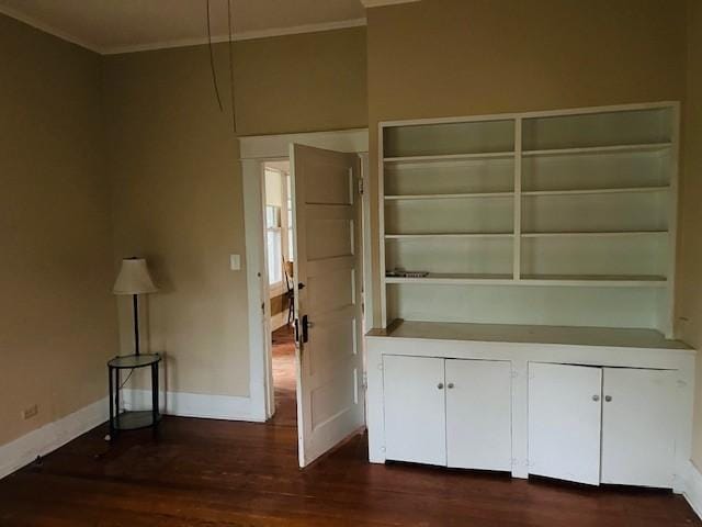 106 Lawrence Ave, Terrell, TX 75160 - interior space featuring crown molding and dark wood finished floors