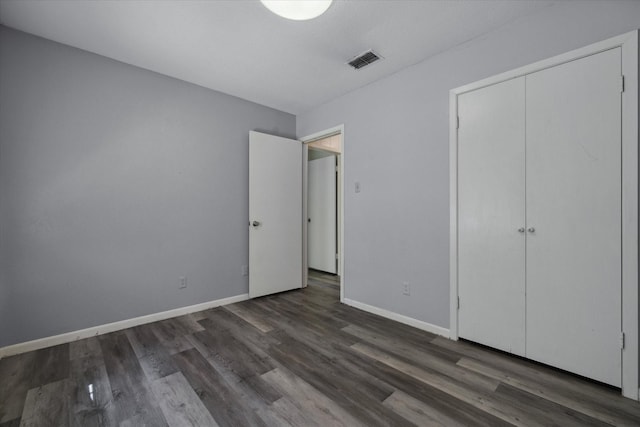 6179 State Highway 31 E, Murchison, TX 75778 - unfurnished bedroom featuring wood finished floors and a closet