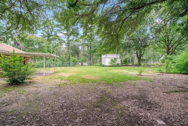 6179 State Highway 31 E, Murchison, TX 75778 - fenced backyard featuring a shed and a patio