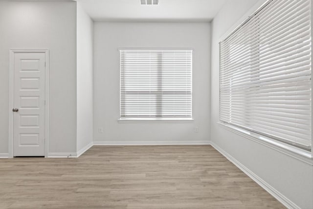 2105 Hazel Lily Run, Mesquite, TX 75181 - spare room featuring light wood-style floors