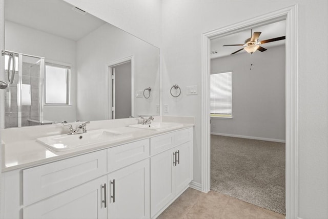 2105 Hazel Lily Run, Mesquite, TX 75181 - full bath with double vanity, a shower with shower door, ceiling fan, and tile patterned floors