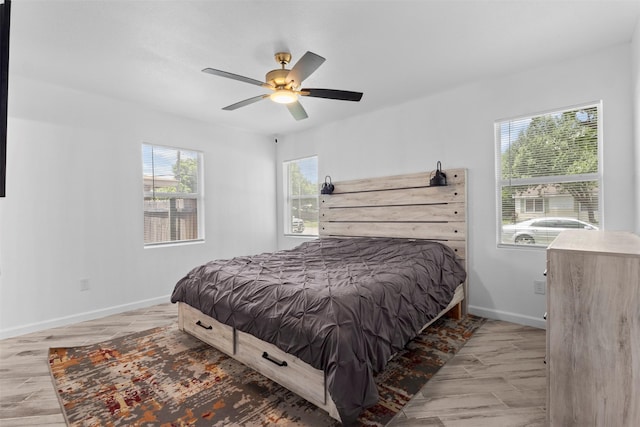 1035 Warden St, Benbrook, TX 76126 - bedroom featuring wood finished floors and ceiling fan