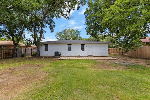 1035 Warden St, Benbrook, TX 76126 - rear view of house featuring a fenced backyard and a wooden deck
