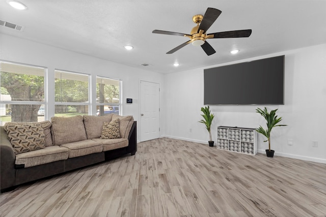 1035 Warden St, Benbrook, TX 76126 - living area with light wood-type flooring, recessed lighting, and ceiling fan