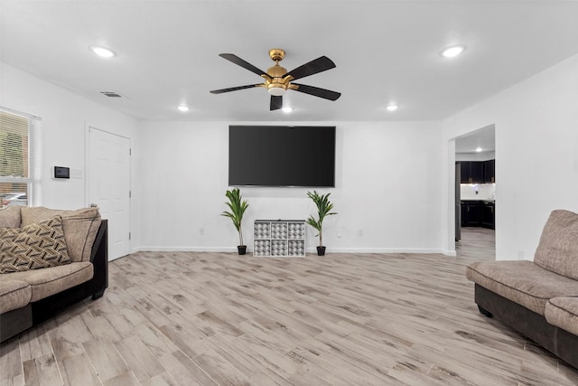 1035 Warden St, Benbrook, TX 76126 - living area with recessed lighting, light wood-style flooring, and ceiling fan