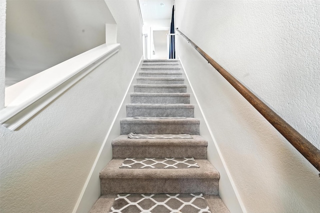 14004 Haggerston Dr, Pilot Point, TX 76258 - stairs featuring a textured wall and carpet floors