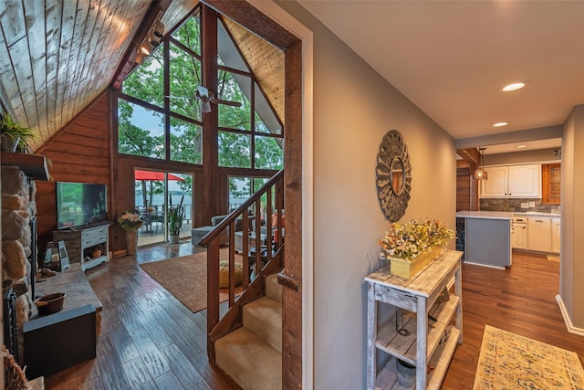 329 Hickory Hill Ln, Scroggins, TX 75480 - stairs with hardwood / wood-style flooring, vaulted ceiling, and recessed lighting