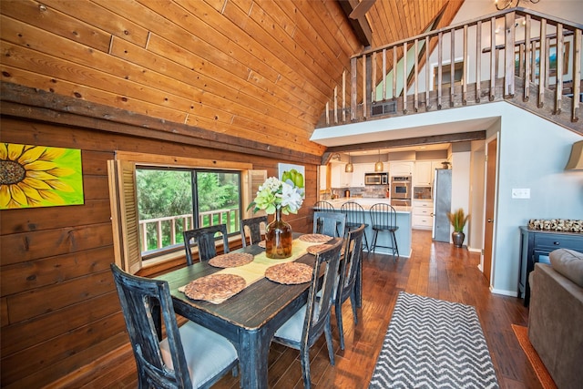 329 Hickory Hill Ln, Scroggins, TX 75480 - dining room featuring dark wood-type flooring, wooden ceiling, and high vaulted ceiling