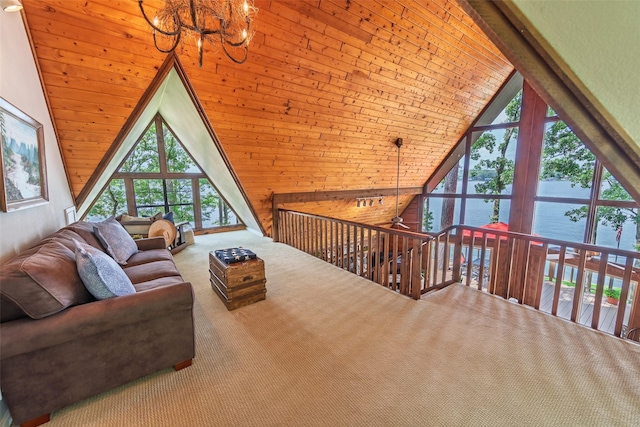 329 Hickory Hill Ln, Scroggins, TX 75480 - carpeted living room with a water view, a chandelier, vaulted ceiling, healthy amount of natural light, and wooden ceiling